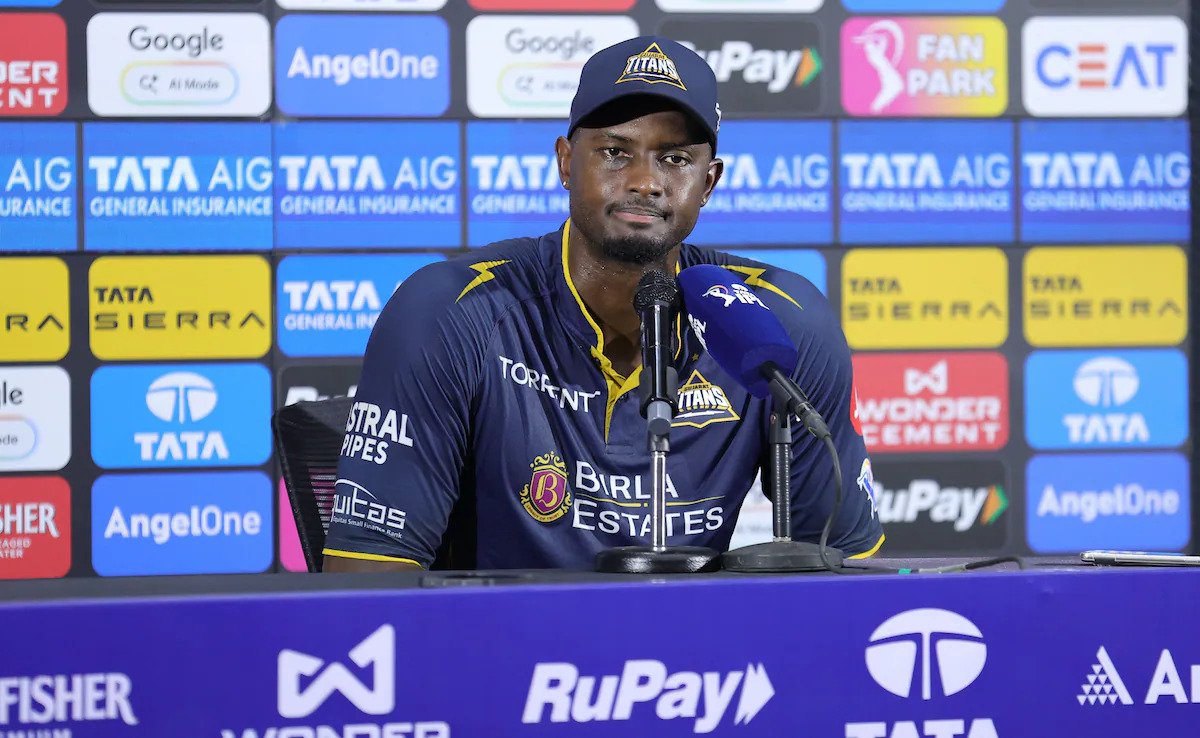 Jason Holder receiving Player of the Match award after Gujarat Titans win over Punjab Kings with Siraj and Rabada mentioned